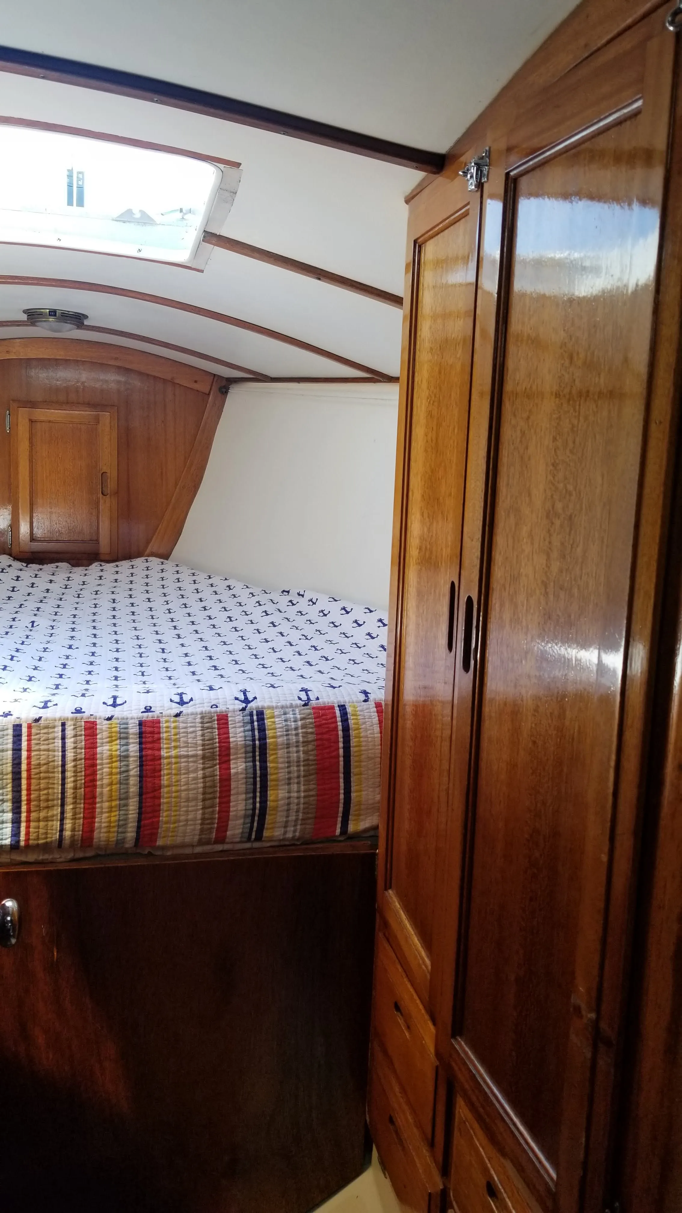 Bow stateroom berth cushions and forward bulkhead
