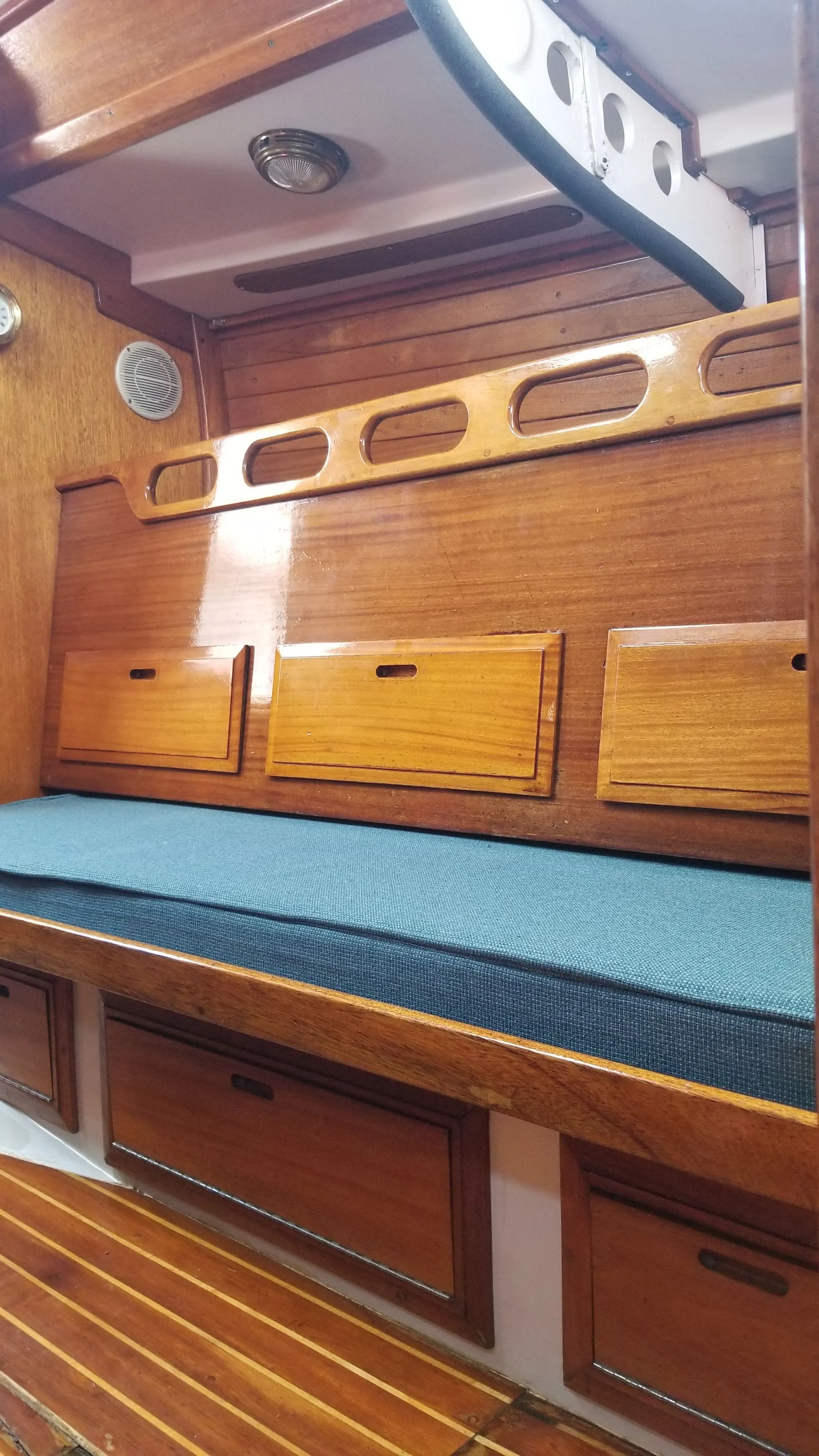 Saloon seating, cushions, and cabin lighting