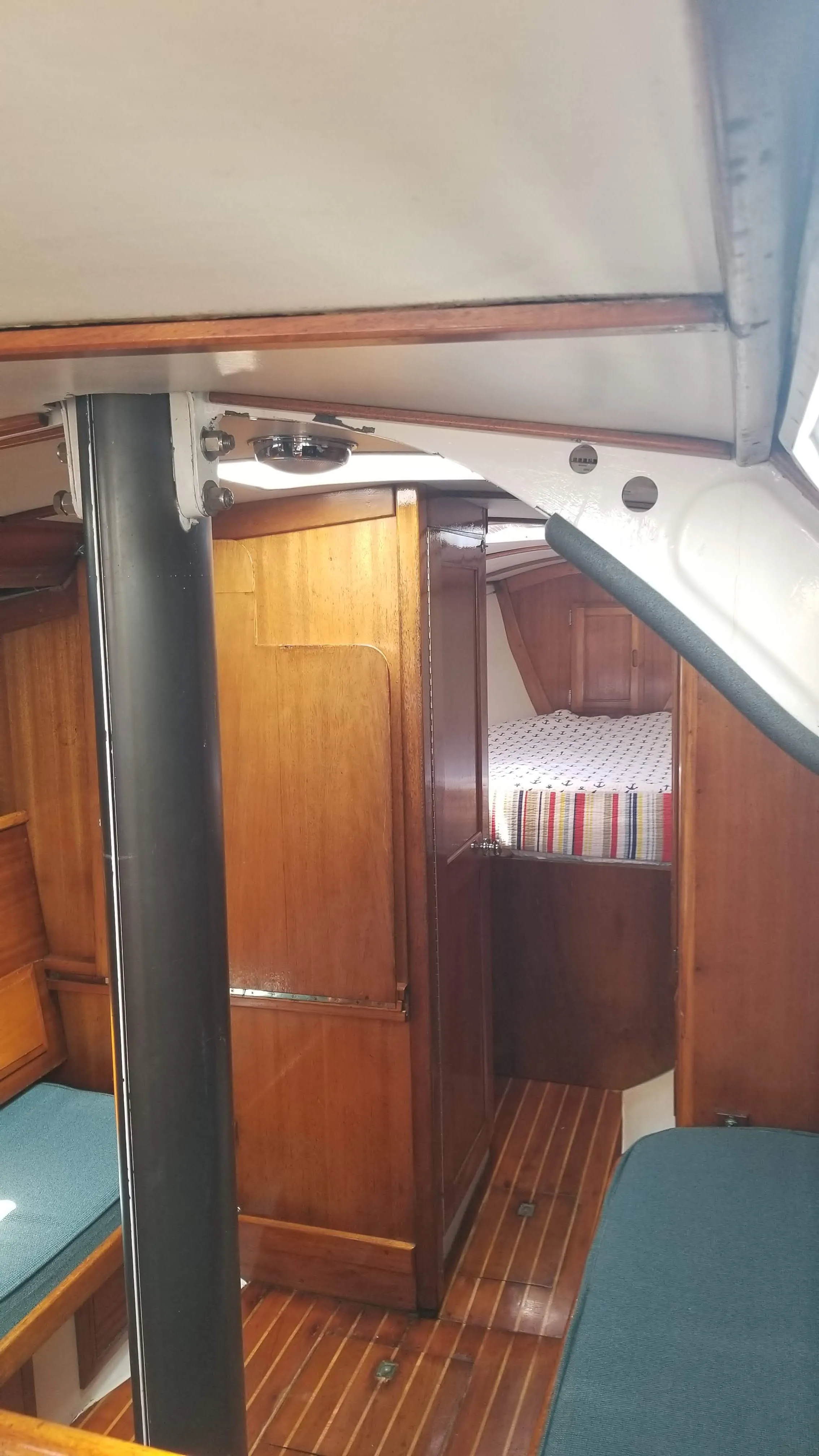 Head vanity, mirror, and small-boat plumbing