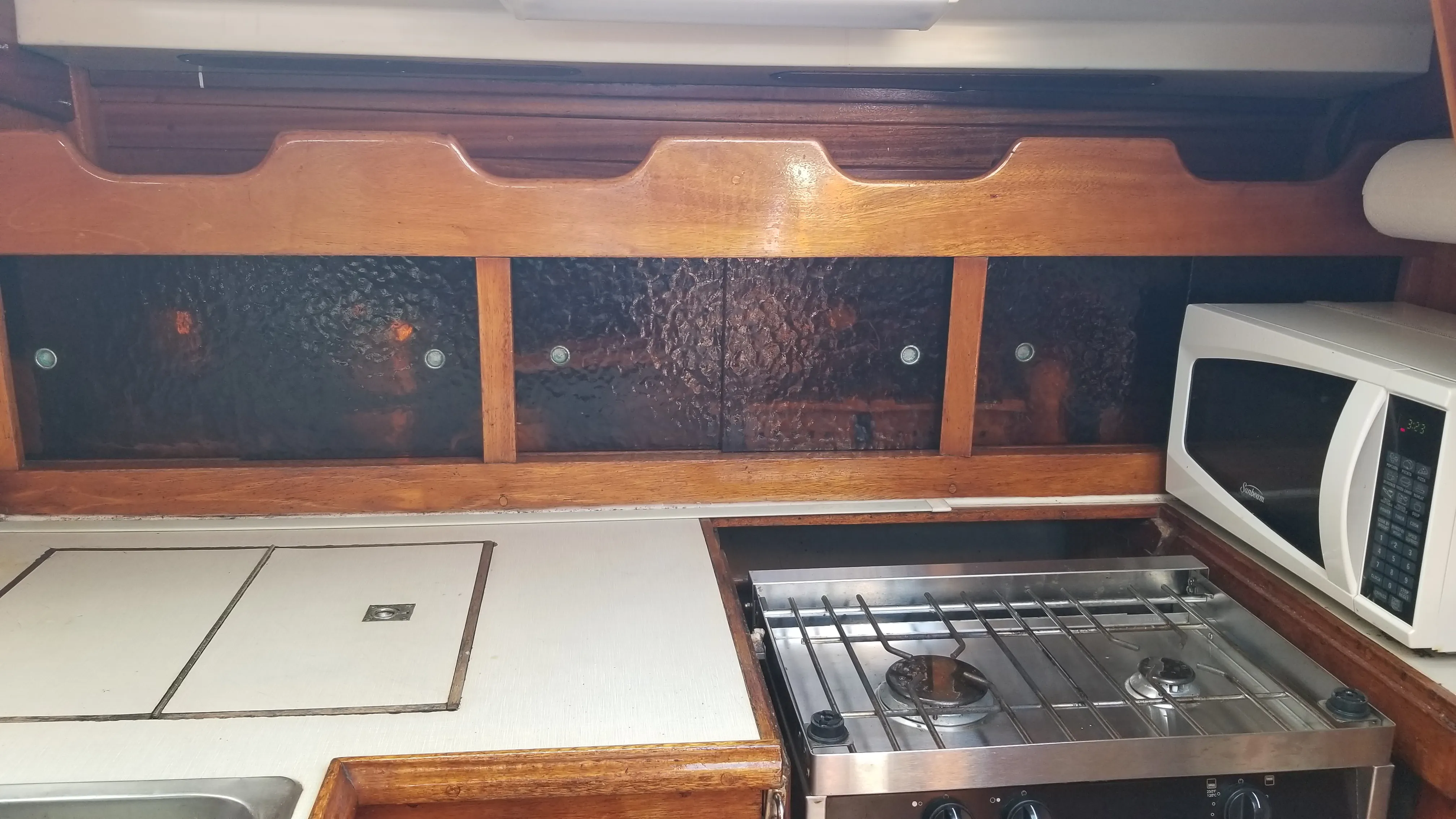 Galley lighting and overhead handholds